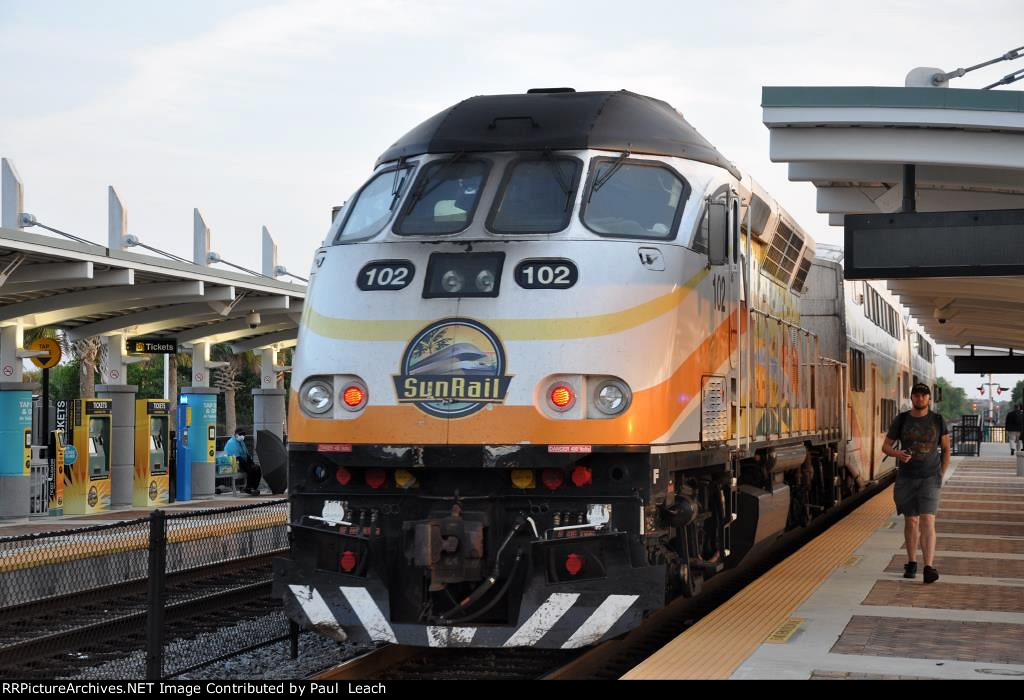 Outbound commuter shoves out of the station